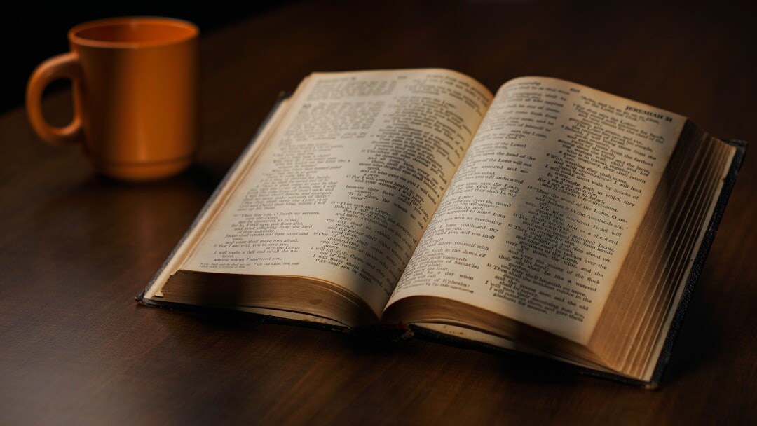 open book on wooden table
